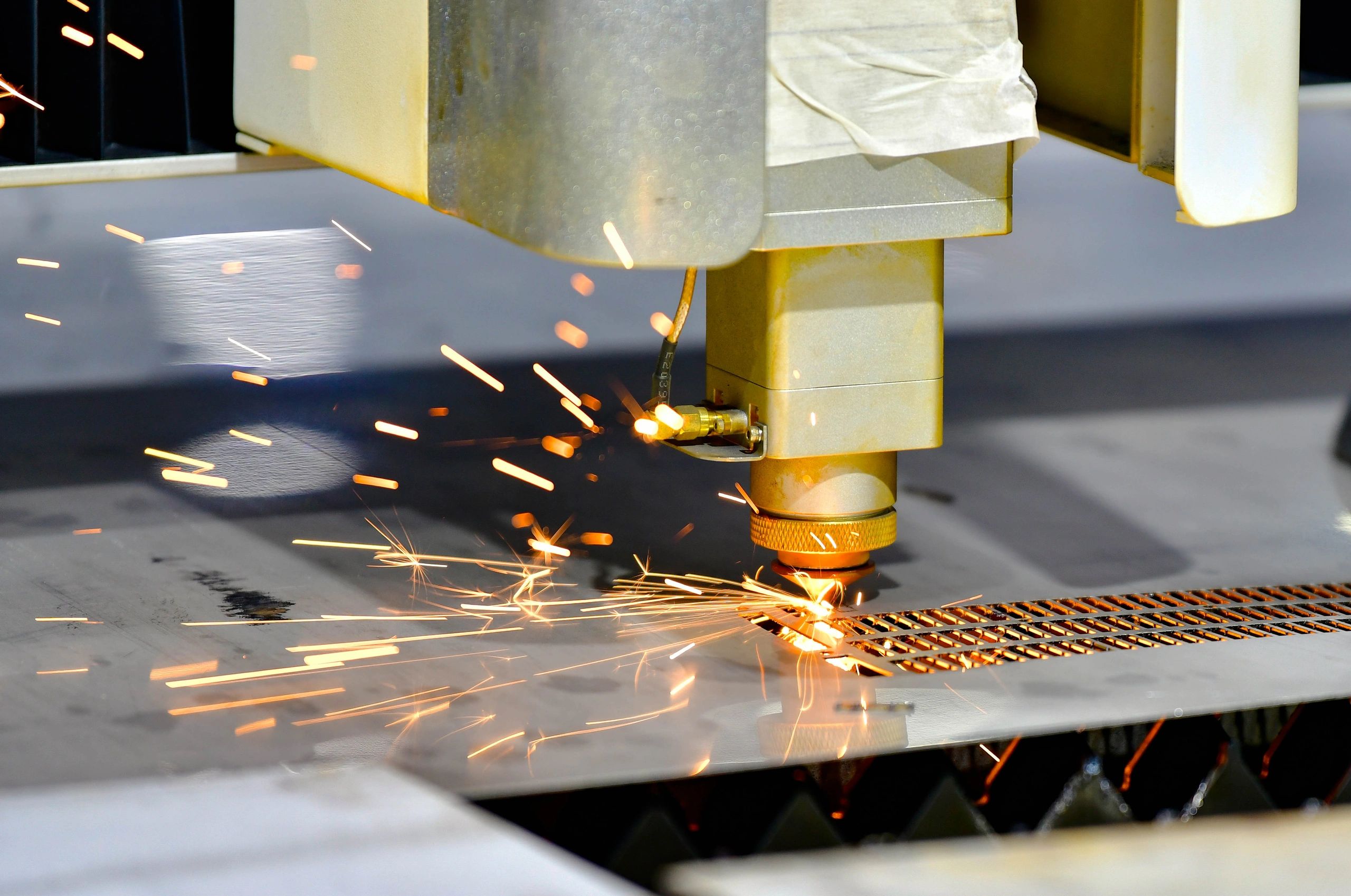 CNC laser cutter processing steel plate